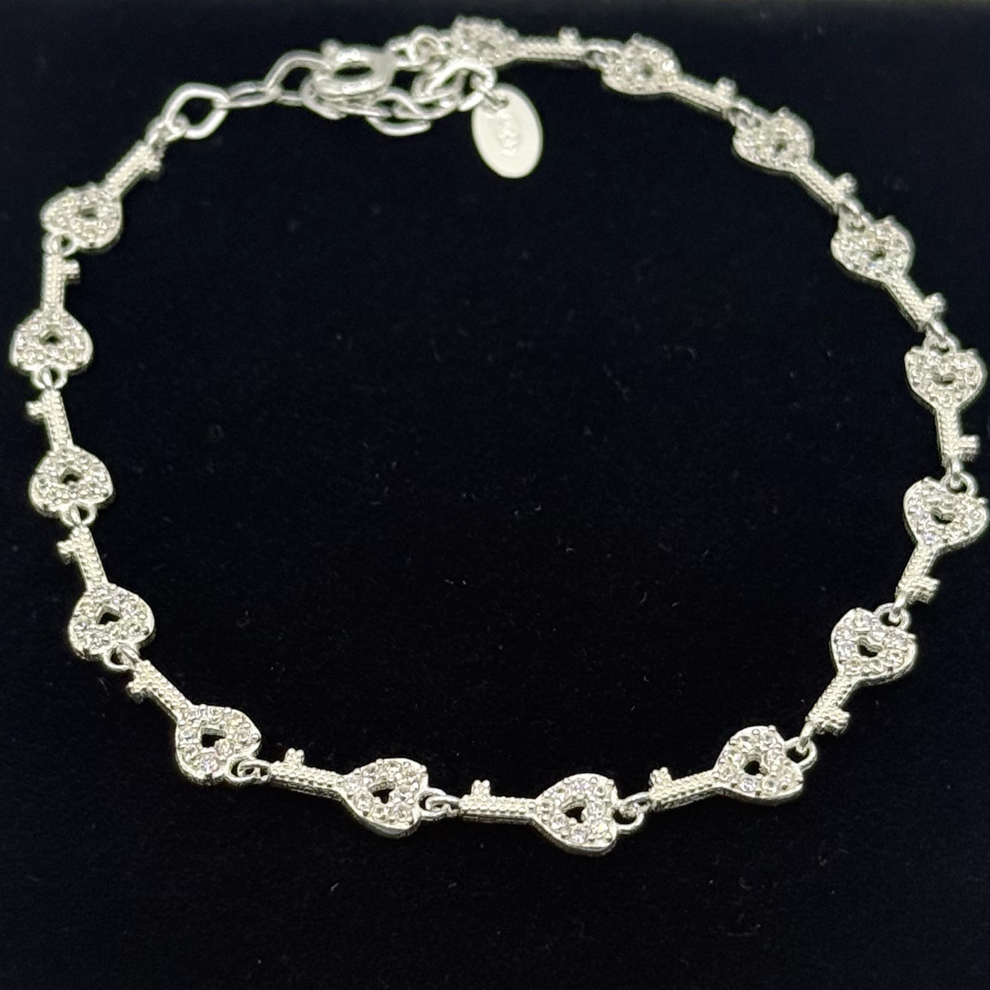 CZ KEY TO MY HEART BRACELET Oppulence
