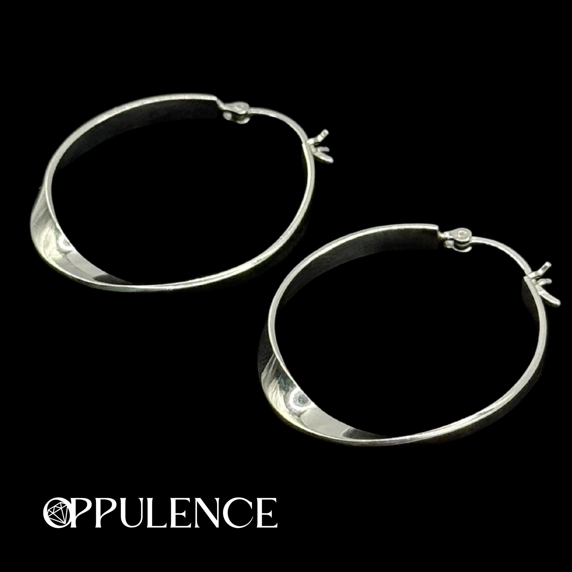 SILVER TWIST 30MM HOOP EARRINGS Oppulence