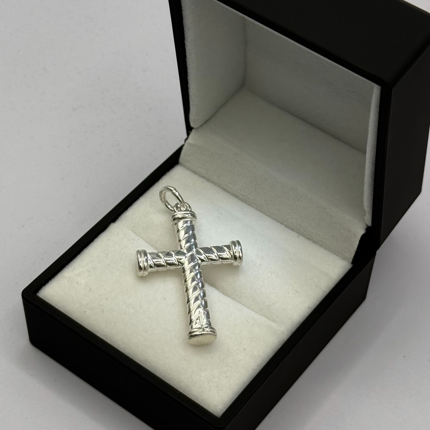 SILVER CROSS SPIRAL PENDANT Oppulence