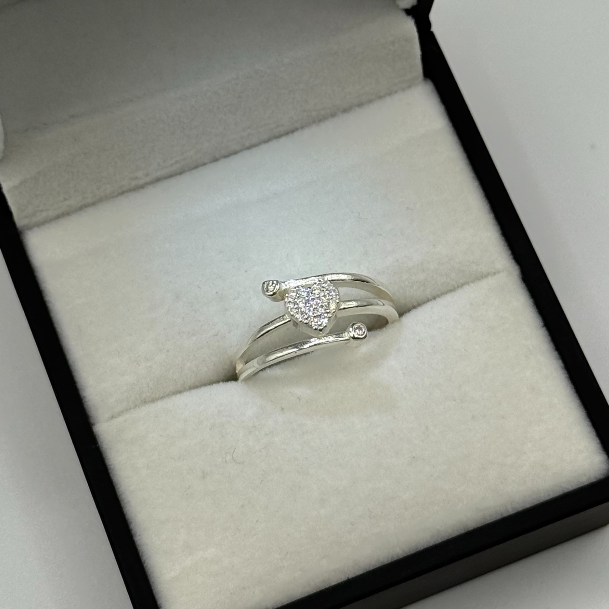 CZ DIAMOND CRUSTED HEART ON TWIST RING Oppulence