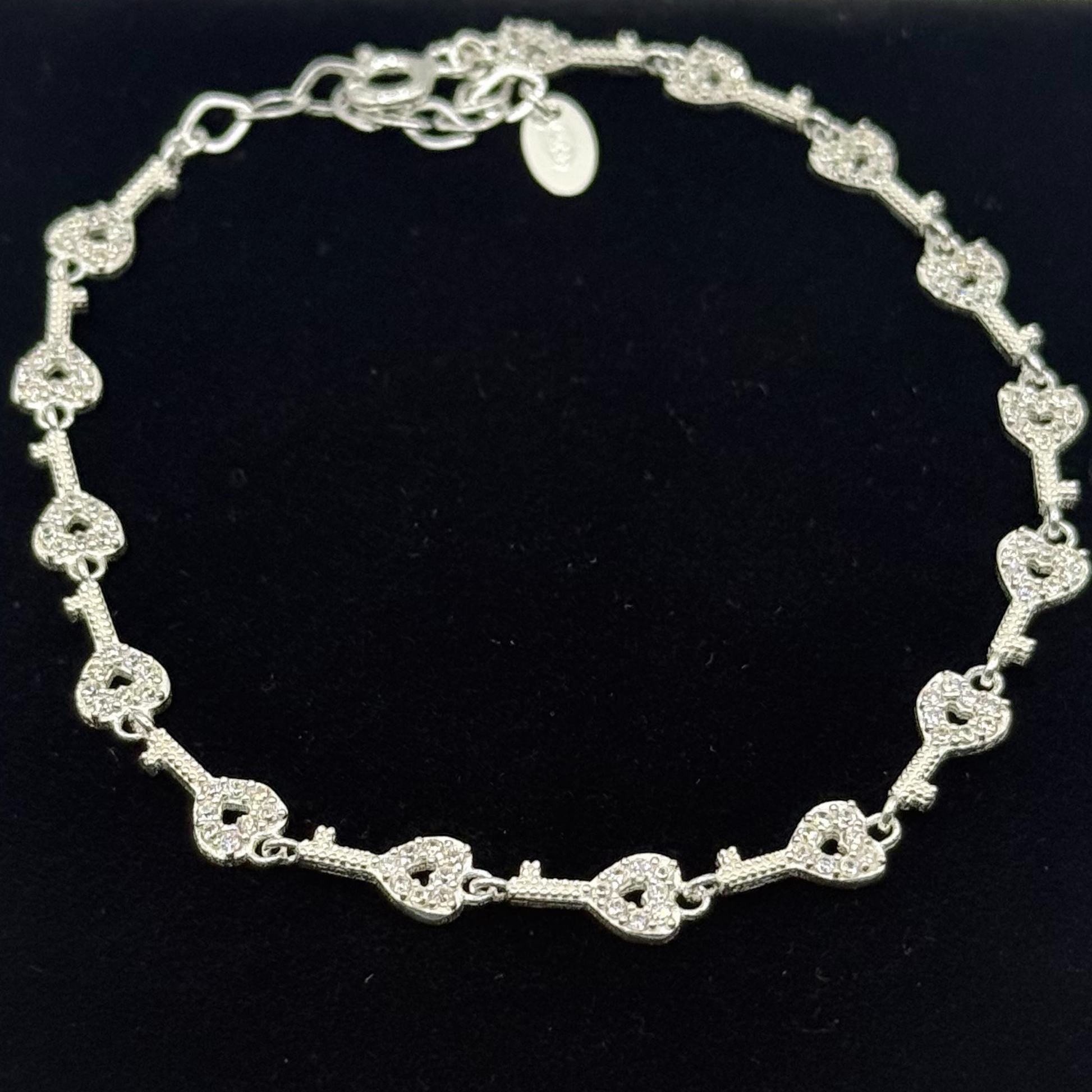 CZ KEY TO MY HEART BRACELET Oppulence